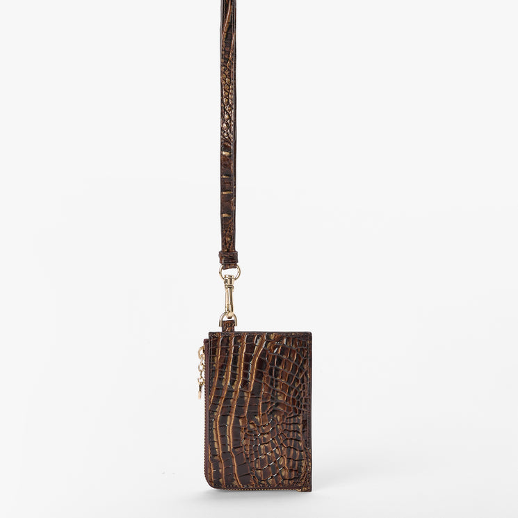 A dark brown crocodile-embossed leather pouch with a matching wrist strap and gold-tone hardware, shown against a plain light gray background. Back view.