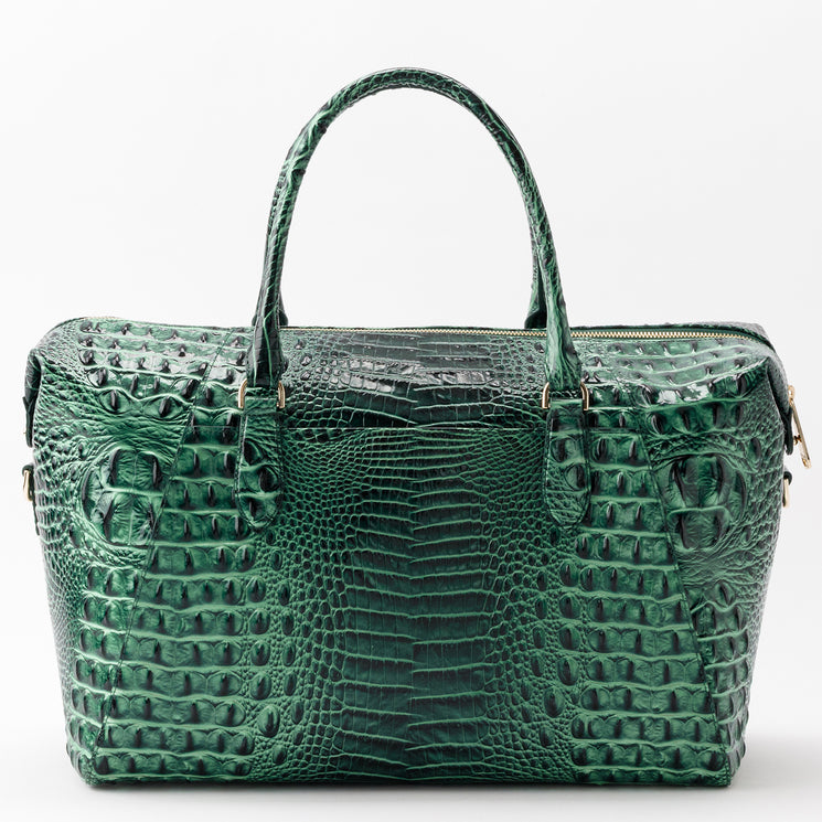 Brahmin Daniela handbag in emerald green with a compact, structured silhouette, dual top handles, and an embossed texture.
