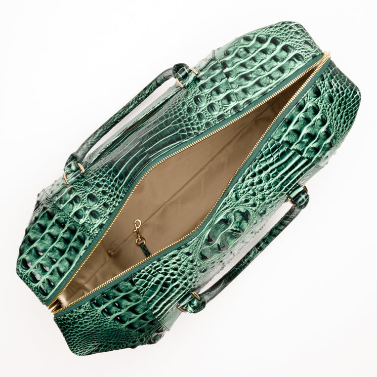 Open, compact Brahmin Daniela satchel featuring a textured embossed pattern, gold-tone hardware, and an open interior.