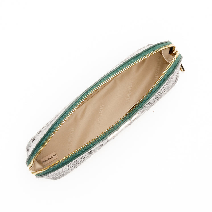 Open Brahmin Marna pencil case in emerald green featuring a textured, croc-embossed exterior and a beige interior lining.
