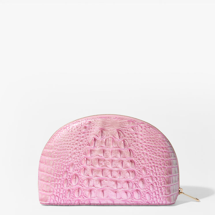 Brahmin pink semi-circular cosmetic bag with embossed textured pattern, gold-tone zipper hardware, and no visible strap, shown on a plain white background.