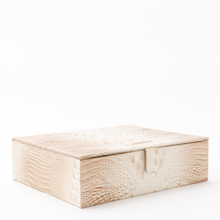 BRAHMIN Large Box in cream with croc-embossed texture, structured silhouette, rectangular shape, gold-tone metal clasp, displayed on a white background. No strap or interior details visible.