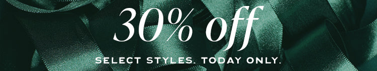 Green satin ribbon background with white text announcing 30% off select styles for today only.