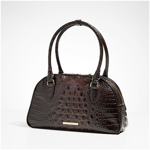 Dark espresso croc-embossed bowler satchel with zip-top closure, double top handles, gold-tone hardware, and logo nameplate on a white background