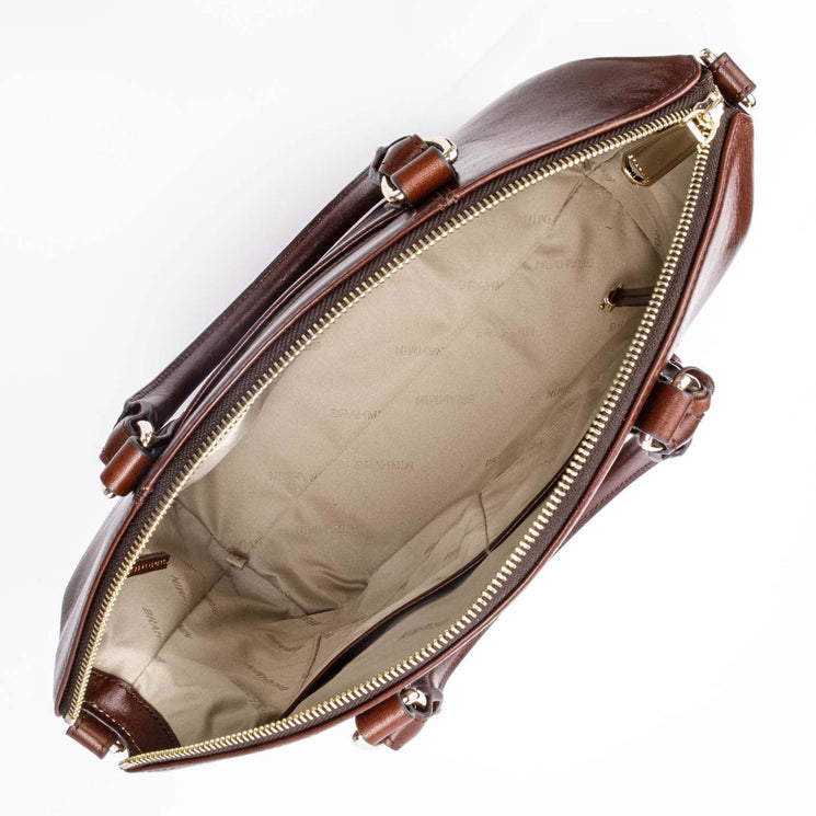 Top view of Brahmin Large Duxbury Satchel in brown with beige lining, gold-tone zipper, dual top handles, spacious interior, and a convertible shoulder strap; signature silhouette and elegant textured finish.