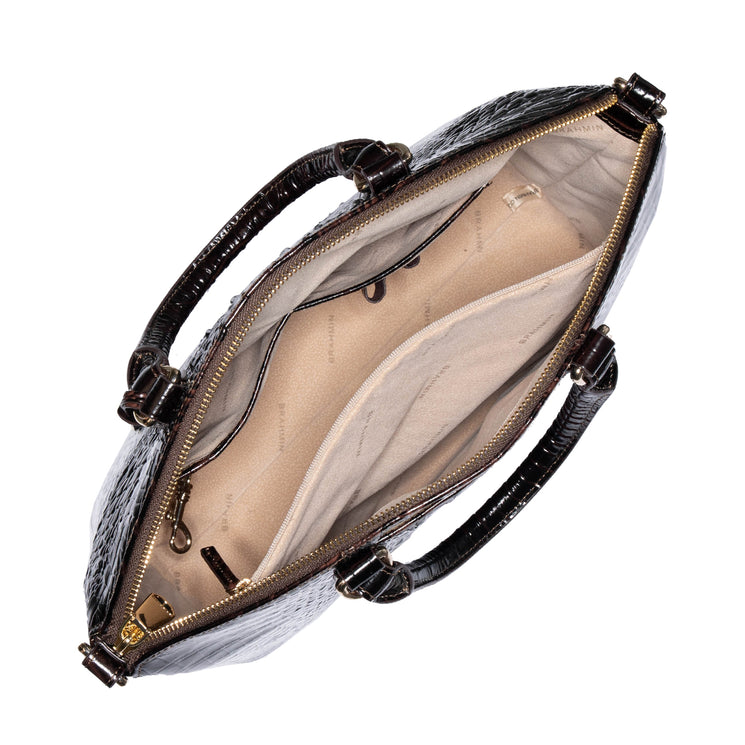 Brahmin open black textured satchel, top view, featuring tan interior with zippered and slip pockets, two dark rolled handles on each side. Spacious silhouette and organized compartments visible.
