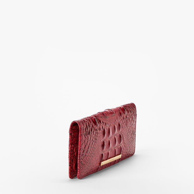 Volcanic Red Melbourne croc textured wallet on a light gray background. Ady Wallet side view.