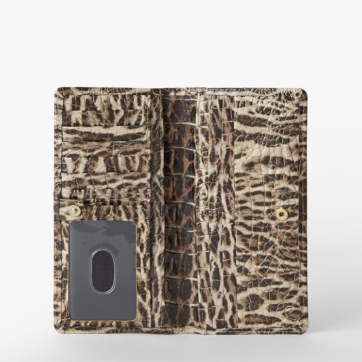Leopard print wallet with a gold clasp on a white background. Ady Wallet open view.