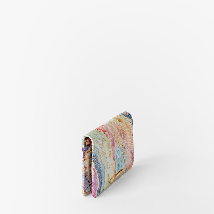Marbled patterned wallet on a white background. Ady Wallet side view.