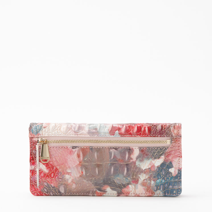 BRAHMIN Ady Wallet, rectangular silhouette, multicolored in red, pink, gray, and blue with a textured finish. Features multiple credit card slots and a gold-tone front zipper pocket. Displayed on a white background.
