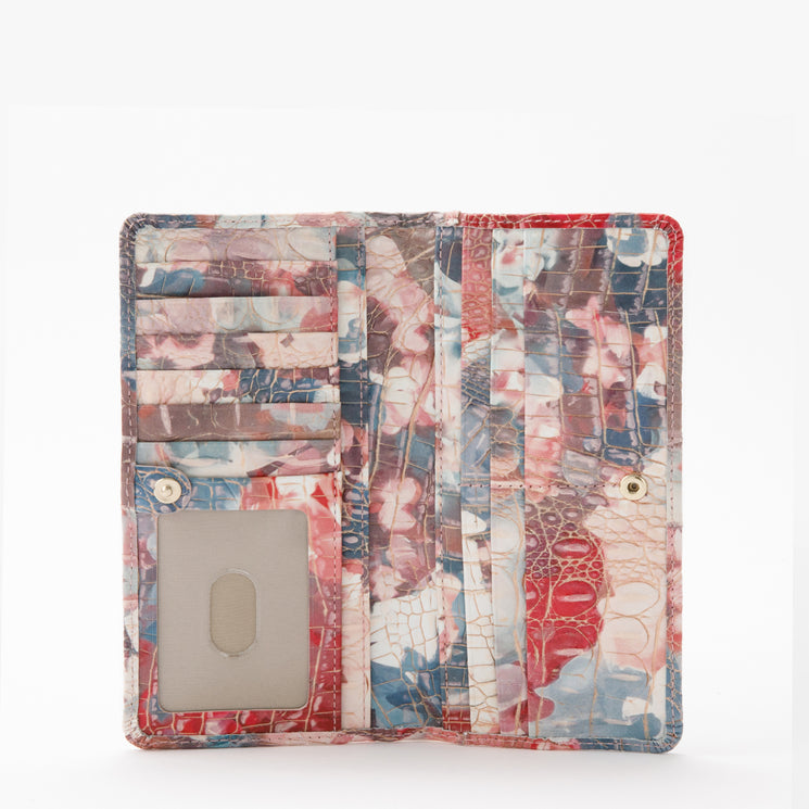 BRAHMIN Ady Wallet in a multicolored textured pattern, shown open to display organized card slots, a clear ID window, and compartments for cash or receipts against a white background.