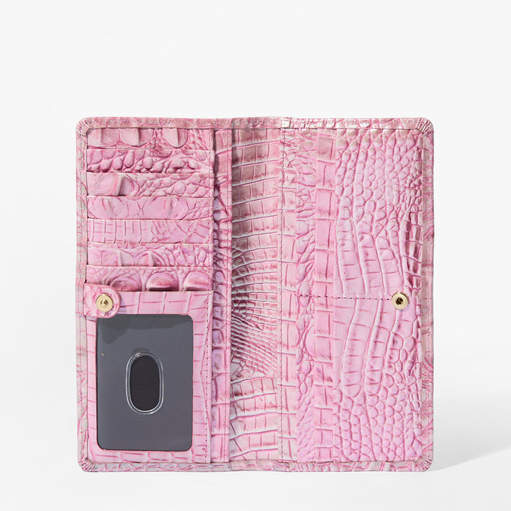 Brahmin pink textured wallet with embossed pattern, snap button closure, multiple card slots, and clear ID window. Open view highlights organized interior against a white background.