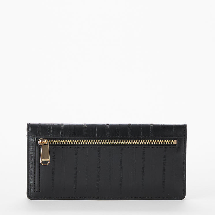 Brahmin black wallet with gold-tone front zipper pocket, vertical embossed textured pattern, and compact rectangular silhouette, shown on a plain white background. No strap or interior is visible in this view.
