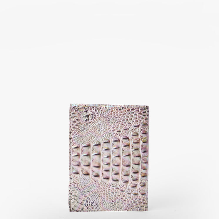 Brahmin rectangular wallet in light pastel hues with a glossy, embossed texture and crocodile-inspired pattern, upright on a plain white background. Compact silhouette with shiny finish, front and side view visible.