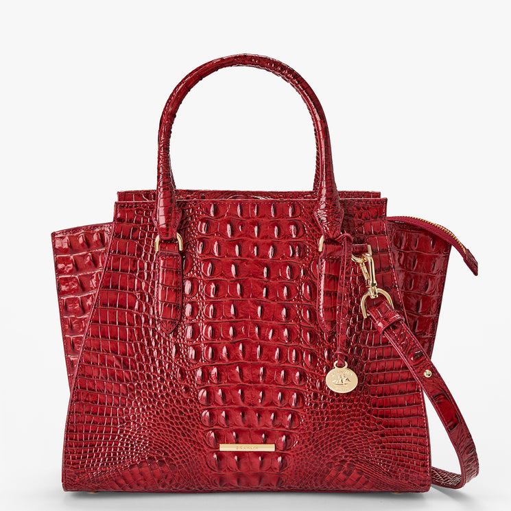 Volcanic Red Melbourne croc textured handbag on a light gray background. Priscilla Satchel front view with strap.