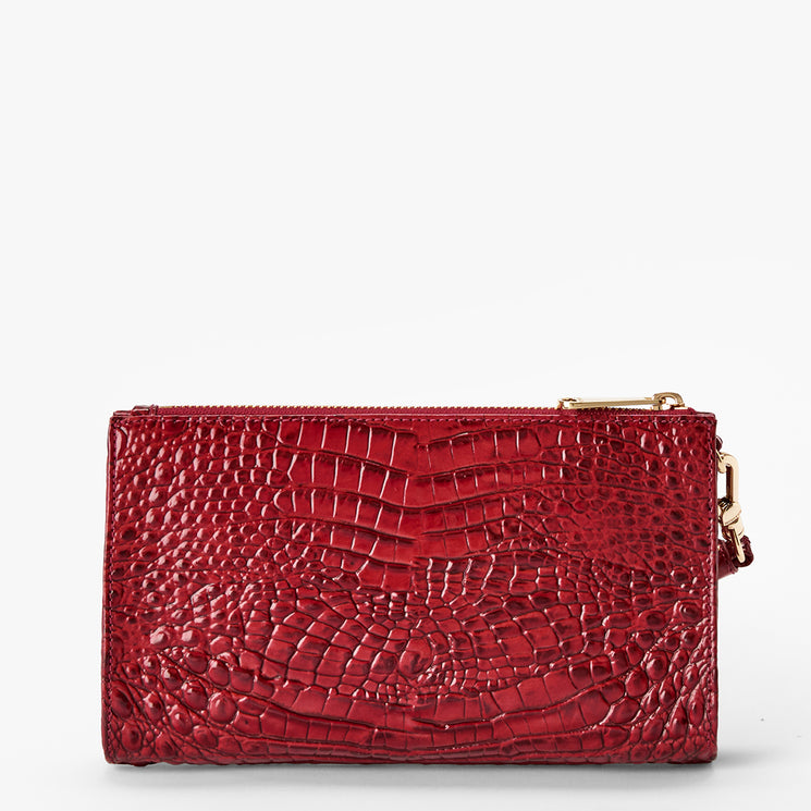 Volcanic Red Melbourne croc textured clucth on a light gray background. Daisy back view.