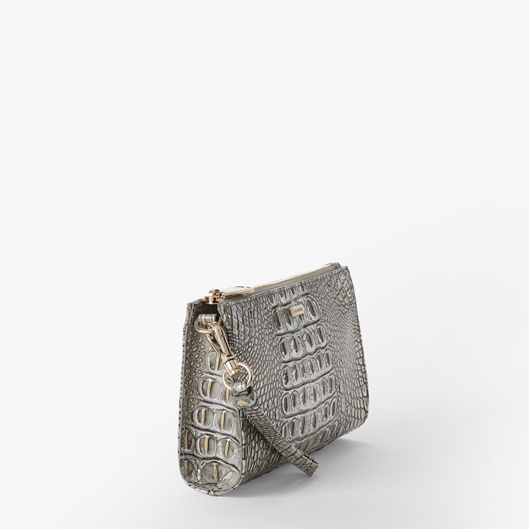 Brahmin small gray clutch with embossed textured pattern, structured silhouette, gold-tone zipper closure, and matching wrist strap, displayed on a white background. Front view highlights hardware and detailing.