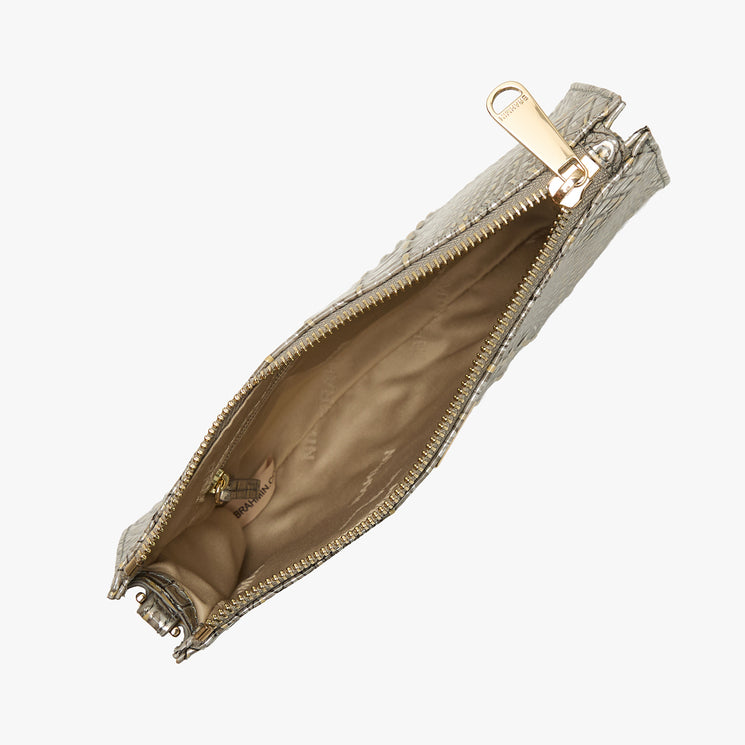 Brahmin metallic textured clutch bag with gold zipper, shown open to display tan fabric lining and small inner pocket. Rectangular silhouette on plain white background. No strap visible.