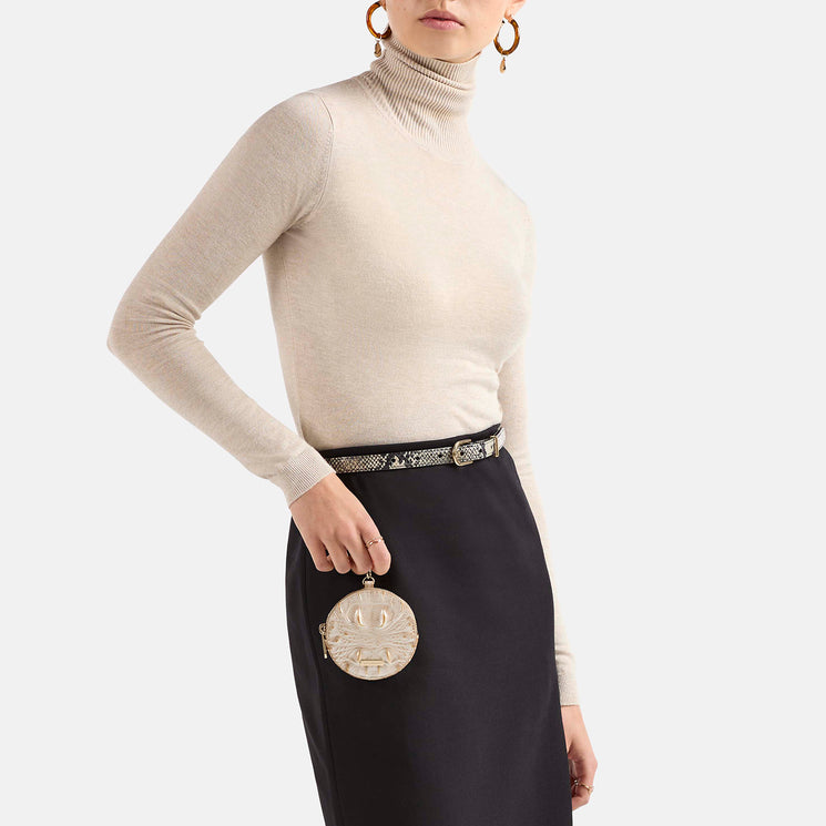 Tan Melbourne Circle Coin Purse Being Held by Model