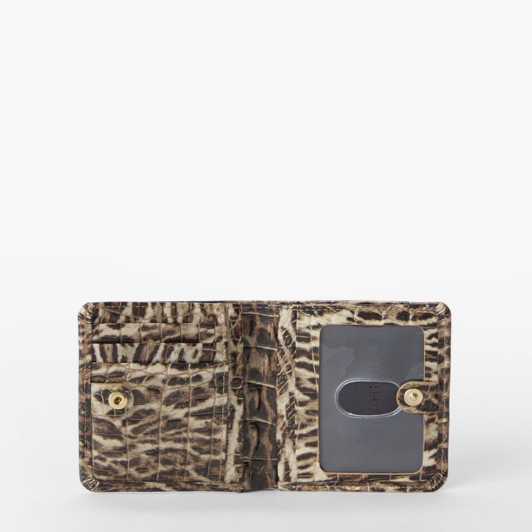 Leopard print wallet with gold accents on a white background. Jane open view.