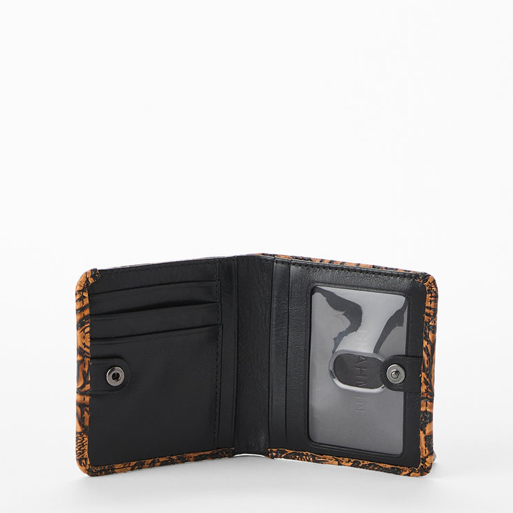 Brown leather wallet with intricate pattern on a white background. Jane wallet open view.