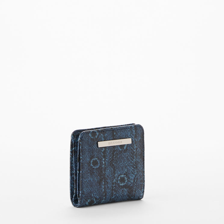 Blue snake print wallet on a white background. Jane side view.