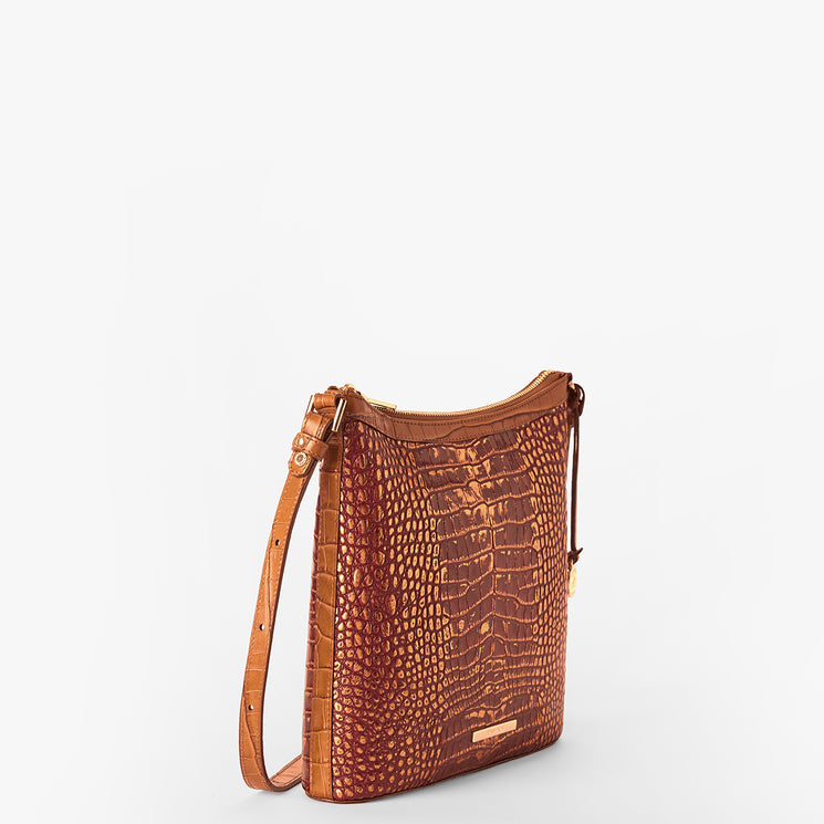 A brown crocodile-embossed leather shoulder bag with a matching leather strap, shown from a three-quarter angle against a clean white background.