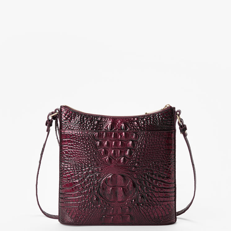 A dark burgundy crocodile-embossed leather shoulder bag with a matching leather strap, photographed against a clean white background. Back view.