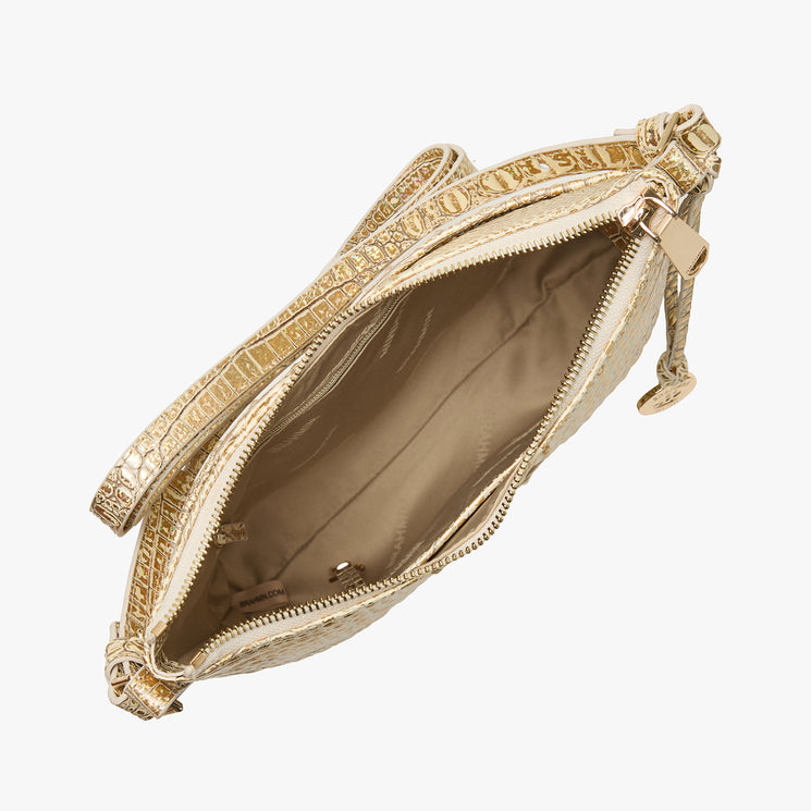 Brahmin gold textured wristlet handbag viewed from above, featuring a zippered top with decorative hardware, beige interior lining, inner pocket, and wrist strap. Bag silhouette and Brahmin logo details visible.