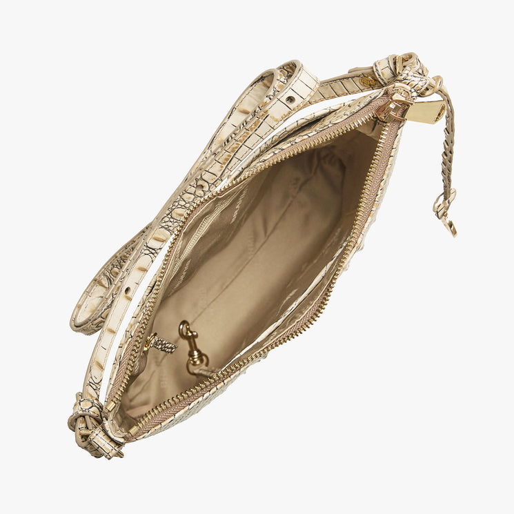 Brahmin beige clutch purse with embossed textured pattern, gold zipper, and spacious light tan interior featuring a small pocket and key clip. Shown open on a white background. No strap visible.