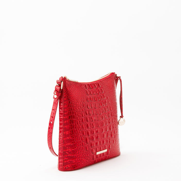 Brahmin Katie Crossbody in Tinsel Red Melbourne with a slim silhouette, gold-tone hardware, zip-top closure, and embossed textured pattern.
