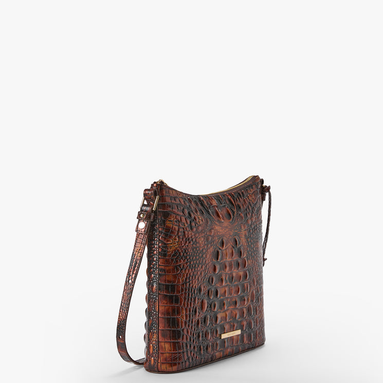 A brown crocodile-embossed leather shoulder bag with a matching strap, shown from a three-quarter angle against a plain white background.