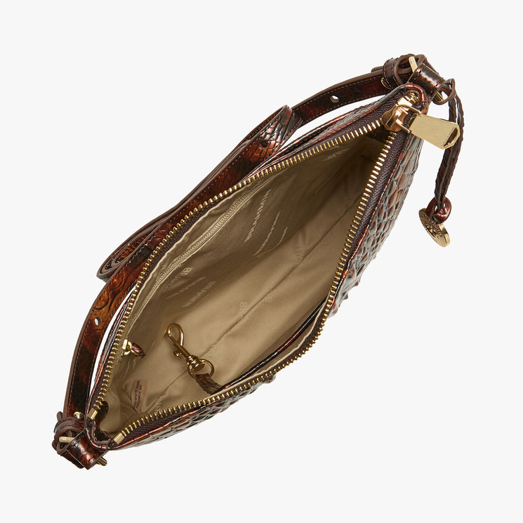 A brown textured leather clutch bag shown open from a top-down view, revealing a tan interior lining and gold-tone hardware, set against a plain white background.