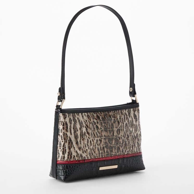 Brahmin handbag with leopard print and black and red leather accents on a white background. Lorelei side view.
