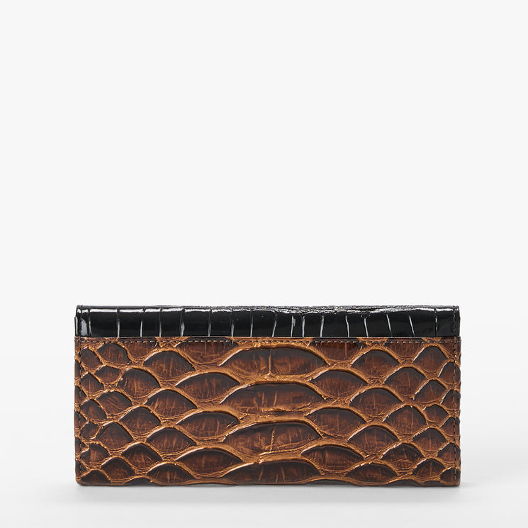A rectangular leather wallet featuring a brown snake skin pattern on the main body and a contrasting black alligator skin trim along the top edge, set against a plain white background.