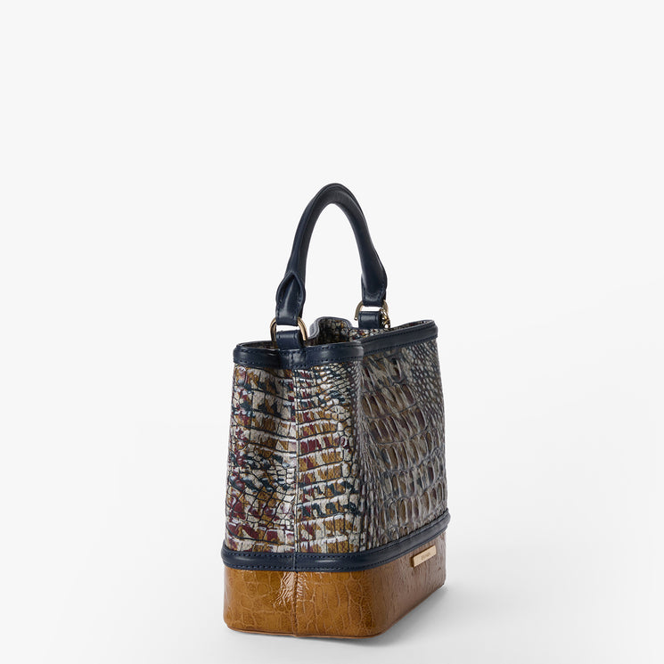 Multicolored textured Mini Amelia handbag with a brown base on a white background. Side view.