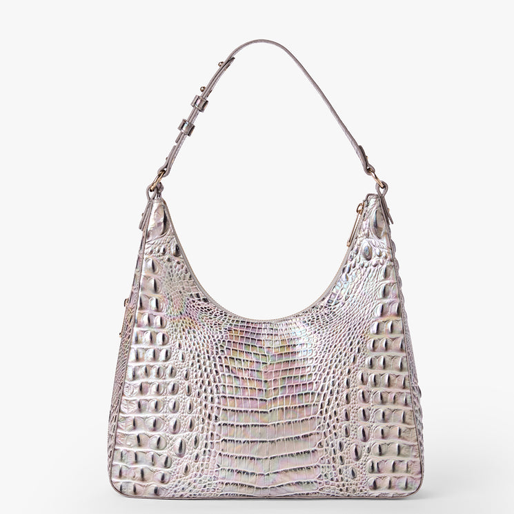 Brahmin iridescent shoulder bag with embossed pattern, structured silhouette, and curved top handle. Shimmering metallic finish, upright on a white background. No interior details or hardware visible from this angle.