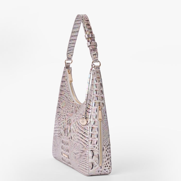 Brahmin iridescent embossed handbag featuring a structured silhouette, gold zipper, and matching textured top handle, upright on a plain white background. No strap or interior details visible in this exterior view.