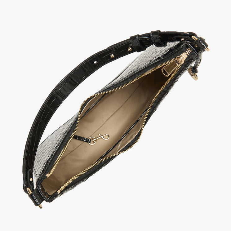 Black crocodile-embossed leather bag with a gold zipper and a beige interior lining, shown open against a light gray background.