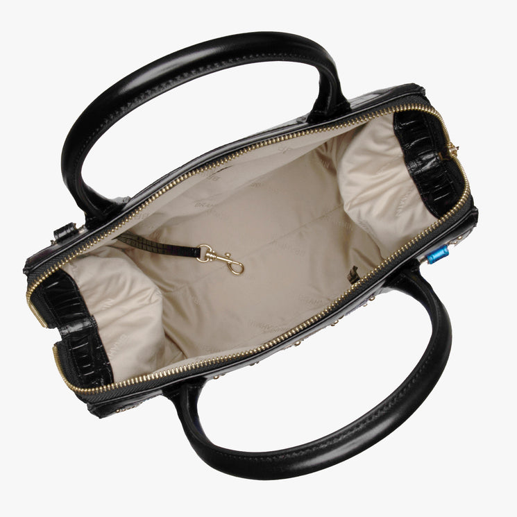 BRAHMIN Small Caroline satchel in genuine leather, top view showing gold zipper, beige spacious interior, side pocket, key leash; structured silhouette with dual handles and refined hardware.