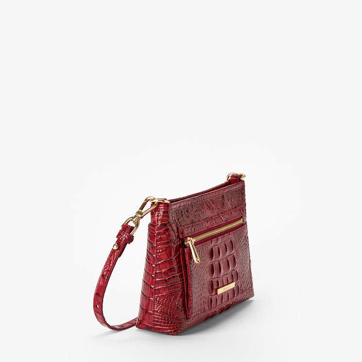 Volcanic Red Melbourne croc textured handbag on a light gray background. Vida side view.