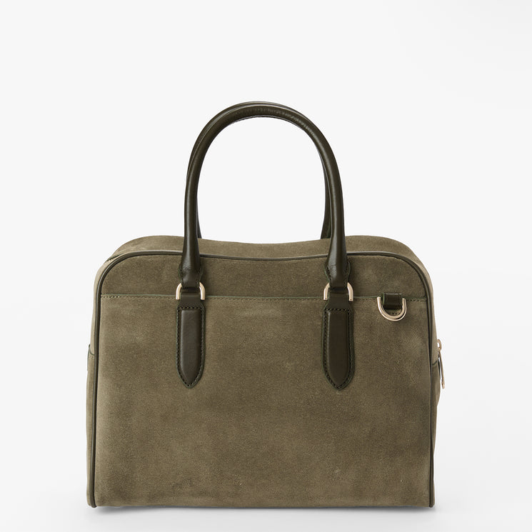 An olive green suede handbag with dark green leather handles and trim, featuring gold-tone hardware, photographed against a plain white background.