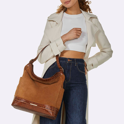 Tan Leather Parin Shoulder Bag Being Worn By Model On the Arm
