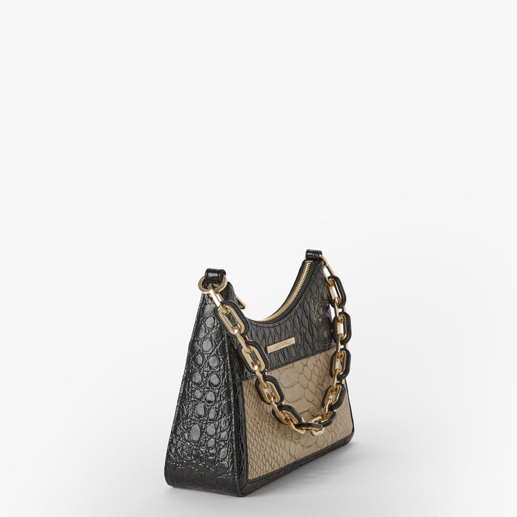 Handbag with black and beige croc pattern on a white background. Mod Esme side view.