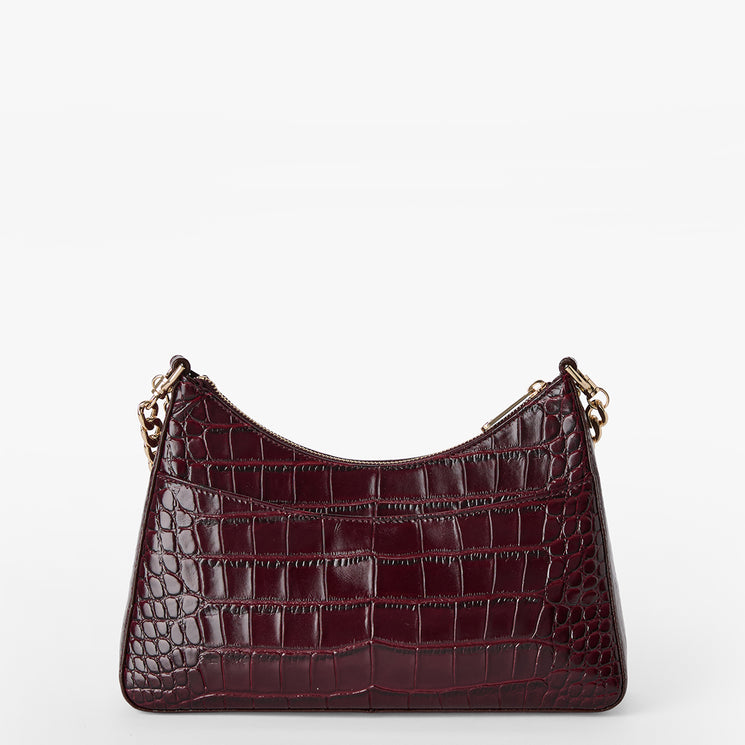 A burgundy crocodile-embossed leather shoulder bag with gold-tone chain strap details, shown against a plain white background.