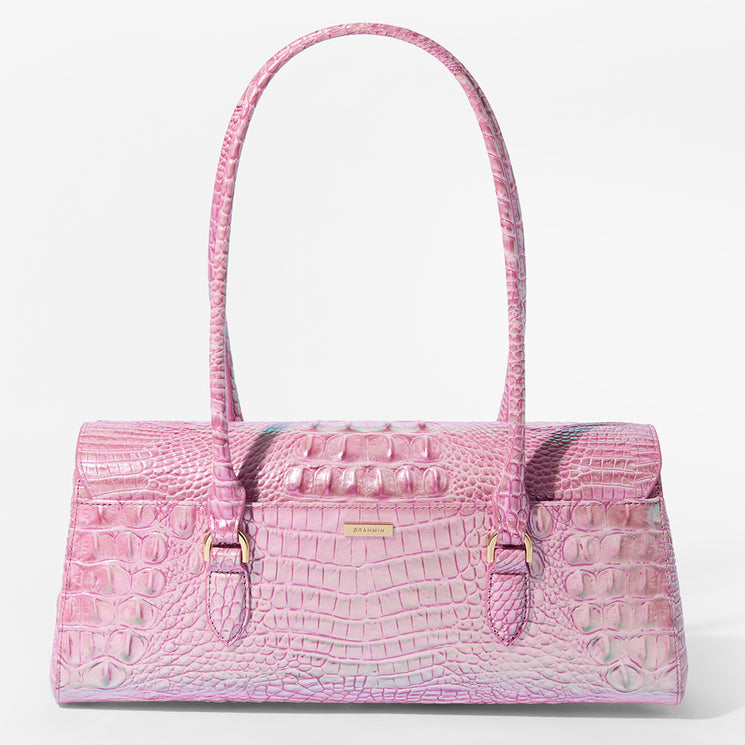 Brahmin pink embossed leather shoulder bag with gold hardware, double straps, and rectangular silhouette on a white background. Features signature textured pattern and structured style.