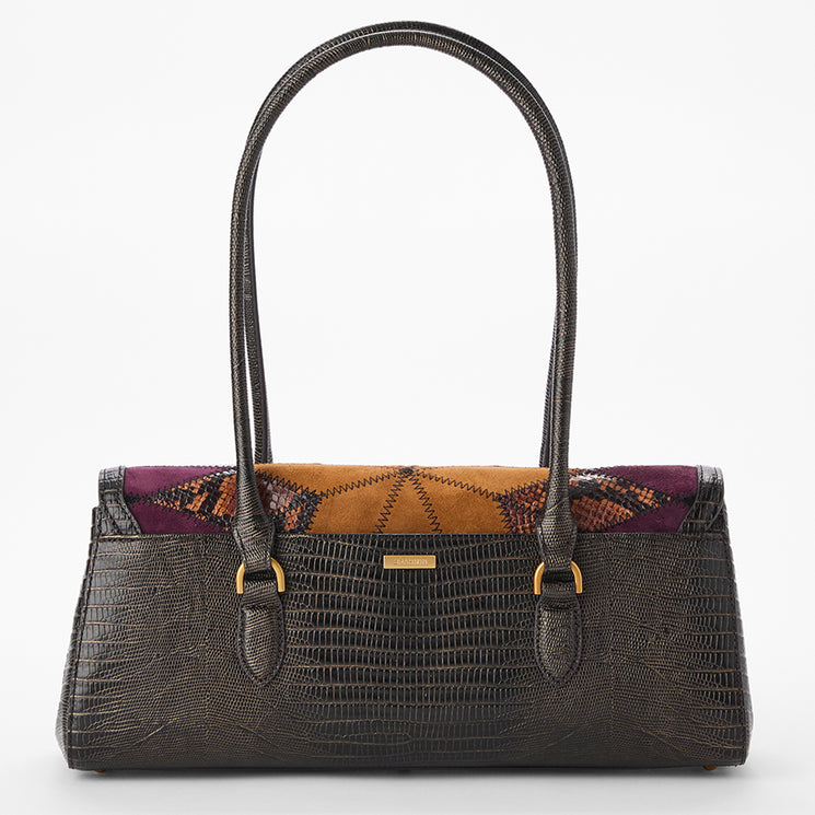 A structured handbag with a dark crocodile-embossed texture, dual top handles, and a colorful patterned fabric panel across the top. The panel features shades of purple, orange, and brown.
