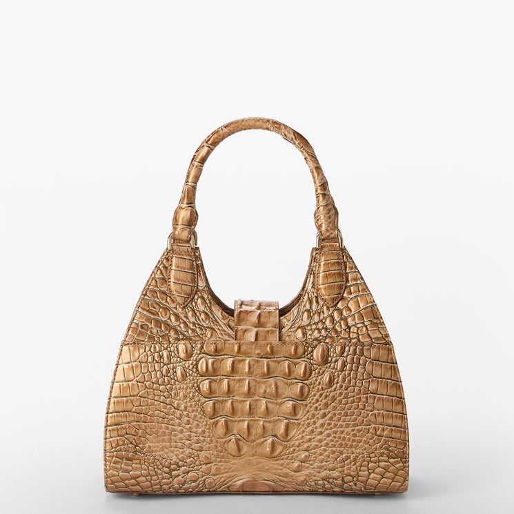 Brown crocodile embossed Adrian handbag on a light gray background back view