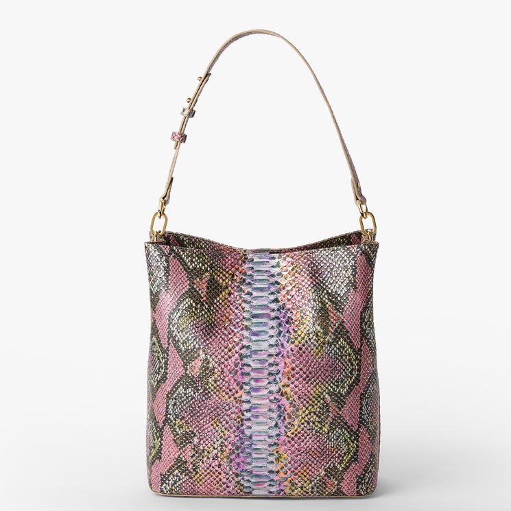 Brahmin bucket handbag with a multicolor textured pattern in pink, purple, yellow, and black, gold hardware, short adjustable strap. Displayed upright on a white background. Structured silhouette visible.