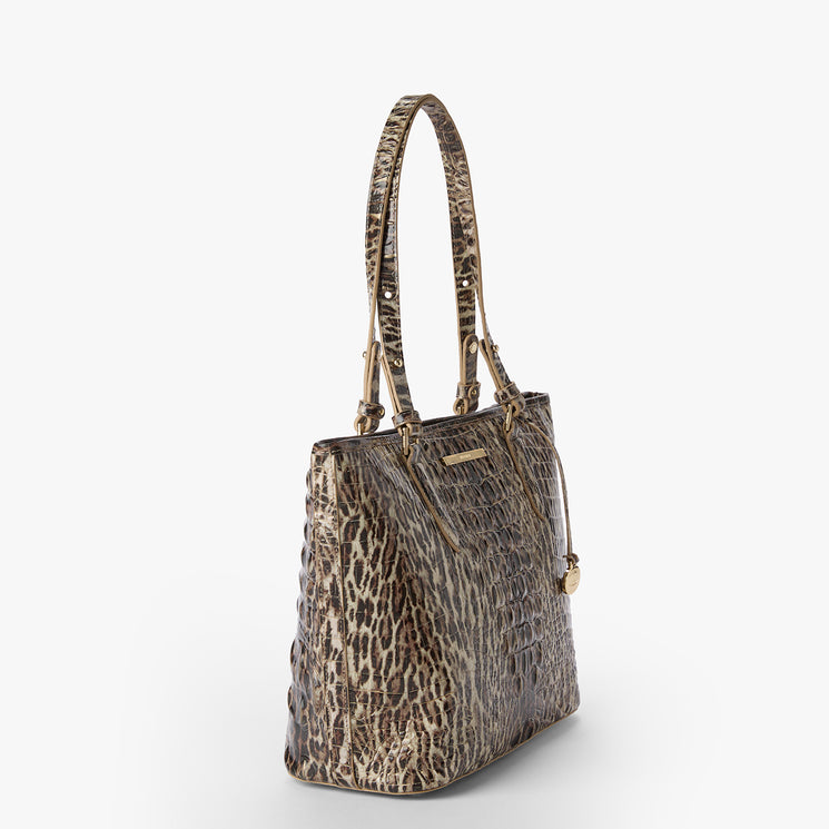 Leopard print tote bag on a white background. Medium Asher side view.